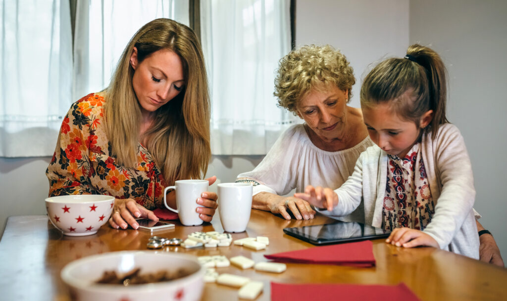 A family sitting at a table