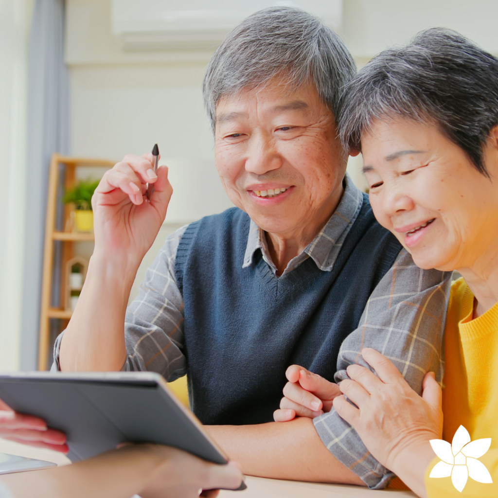 Senior couple looking at tablet together