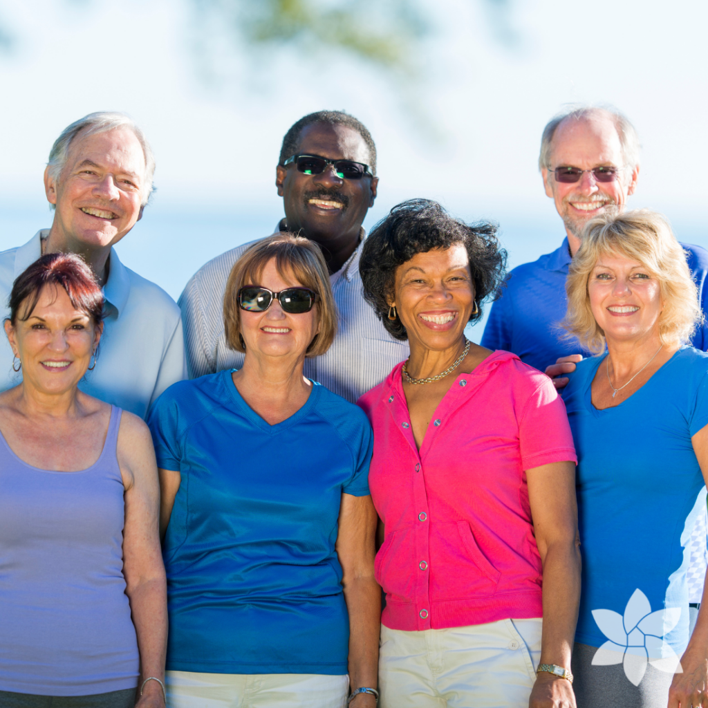 A group of active senior adults standing for a group photo