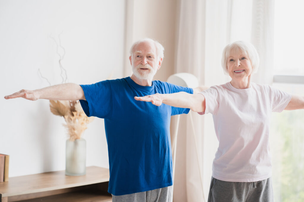 Senior couple doing fitness exercises