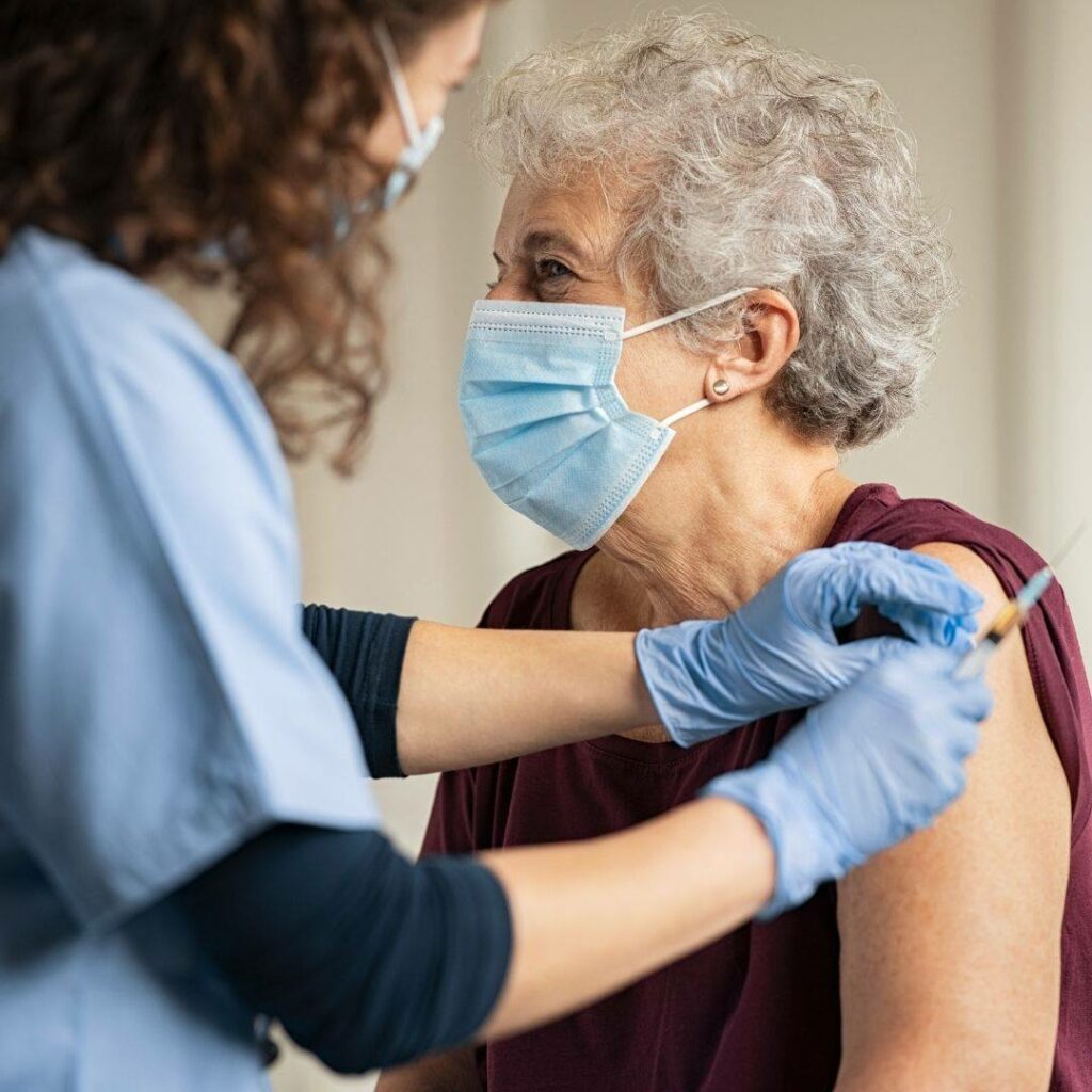 Senior woman getting Vaccine