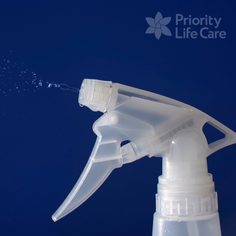 Image of a spray bottle spraying