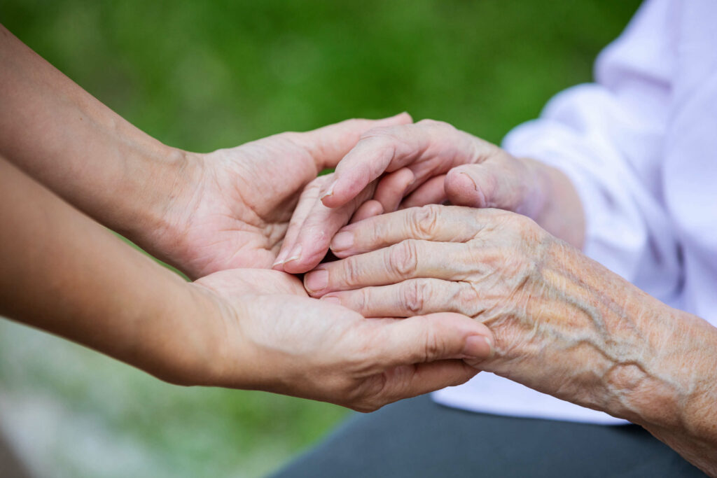 two people holding hands