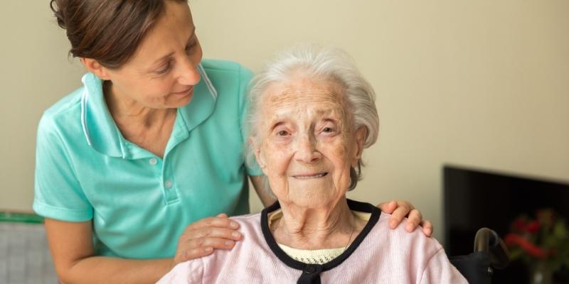 Senior woman with a caregiver