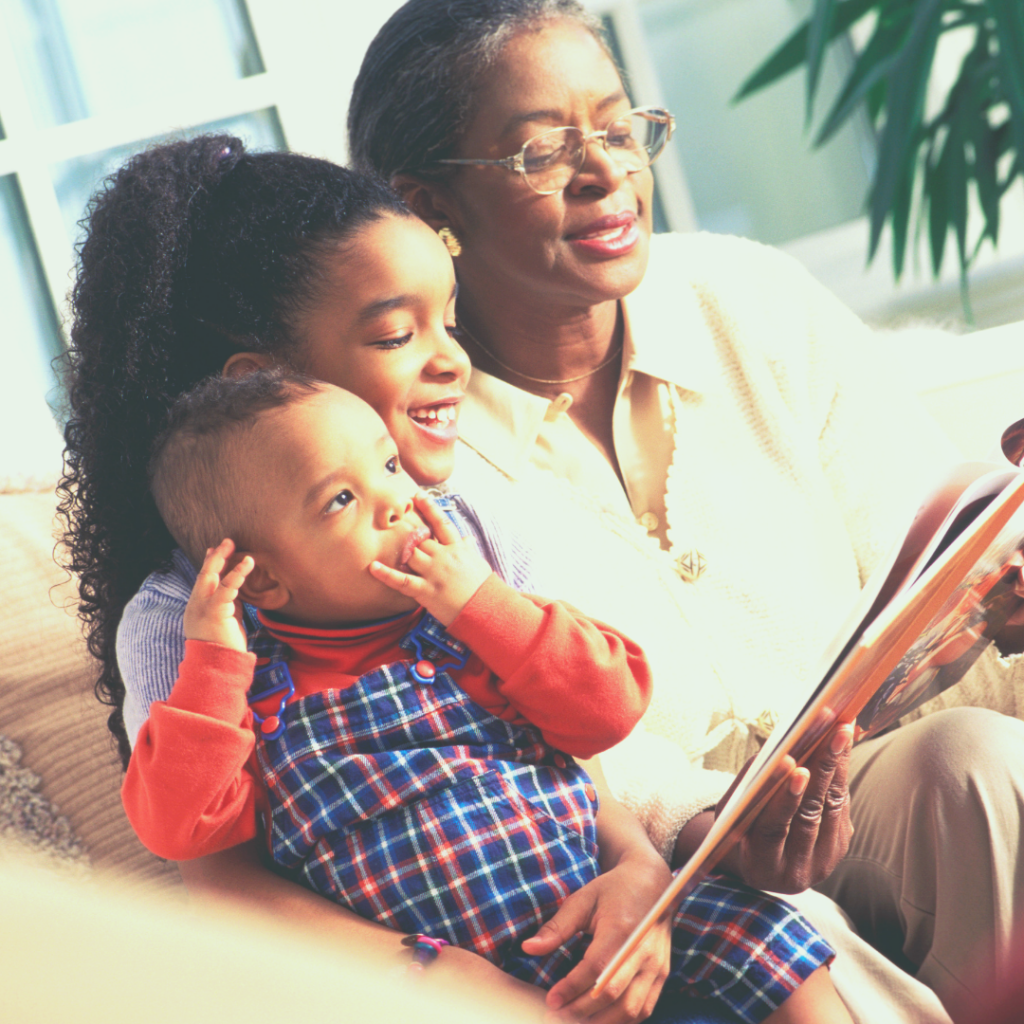 Senior women reading to her grandchildren