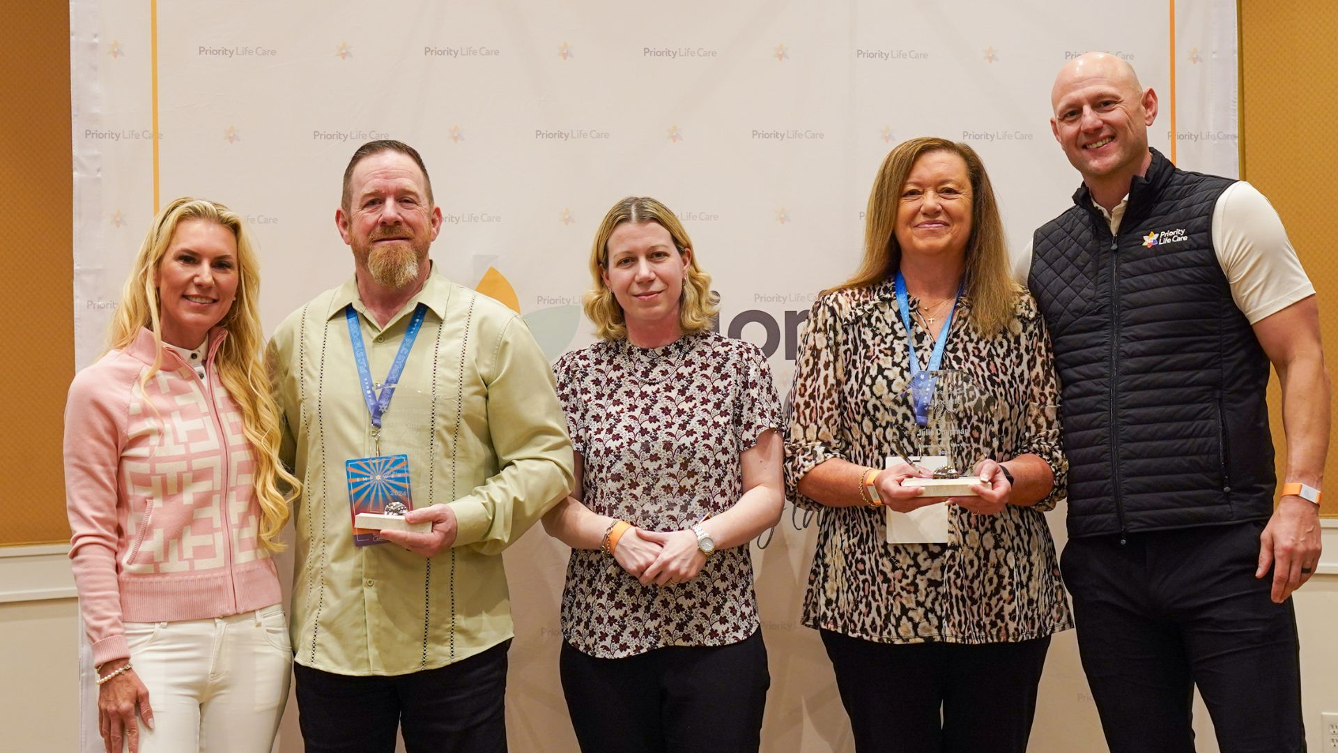 Associate of the Year Nominees posing together for a photo.